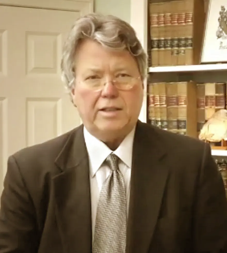 J. Calhoun Pruitt, Jr., attorney, in his Anderson office library