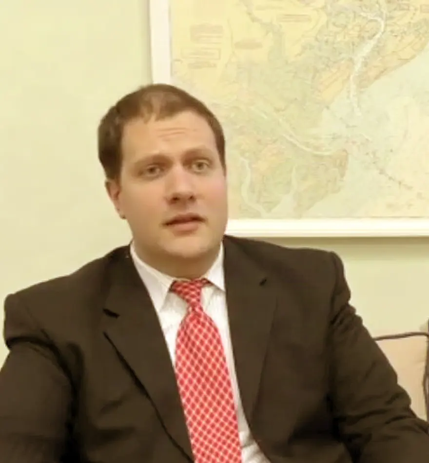 Joshua B. Raffini, attorney, in a conference room at the firm